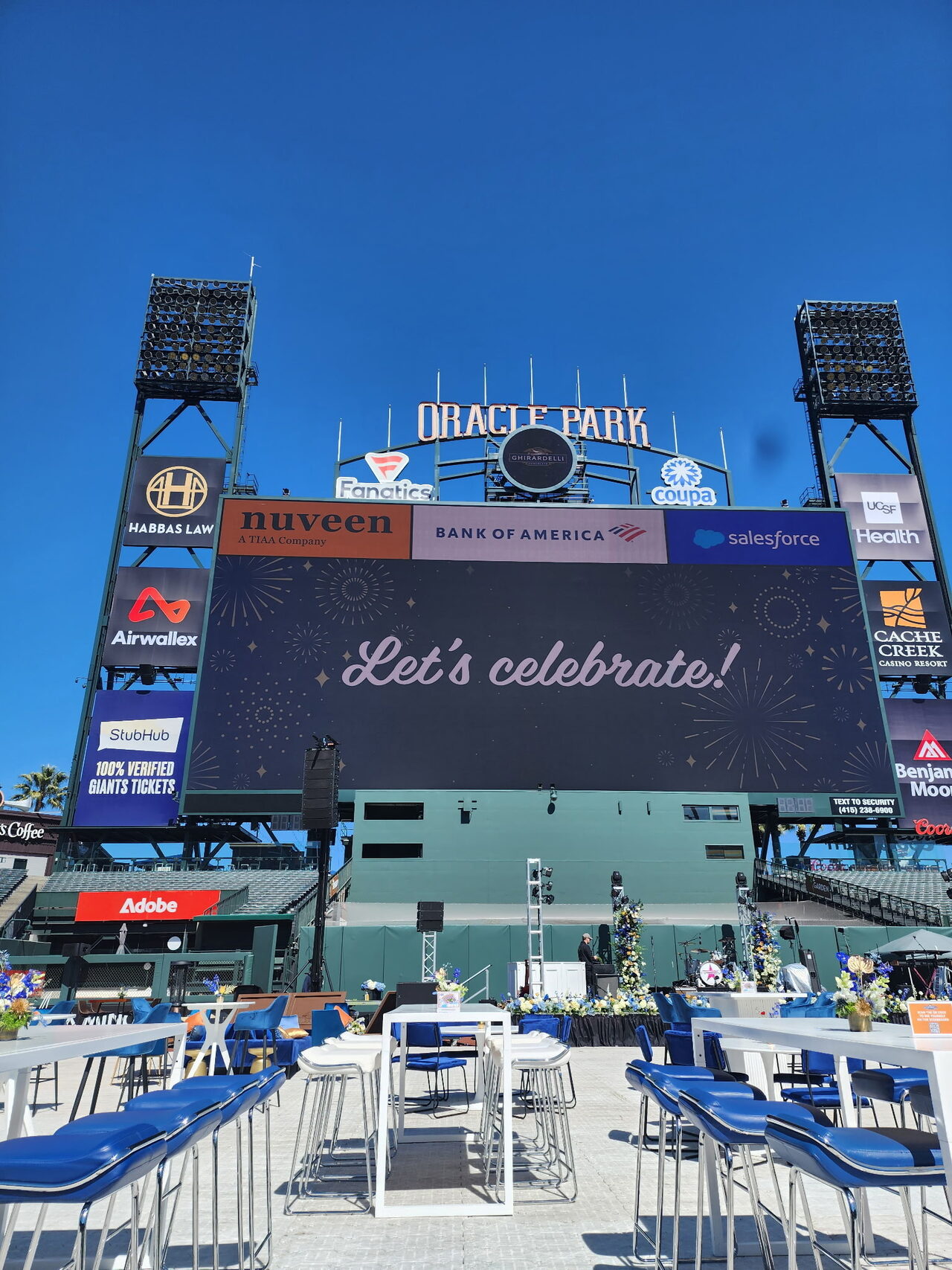 Casino party setup at Oracle Park with the Let's Celebrate scoreboard in San Francisco