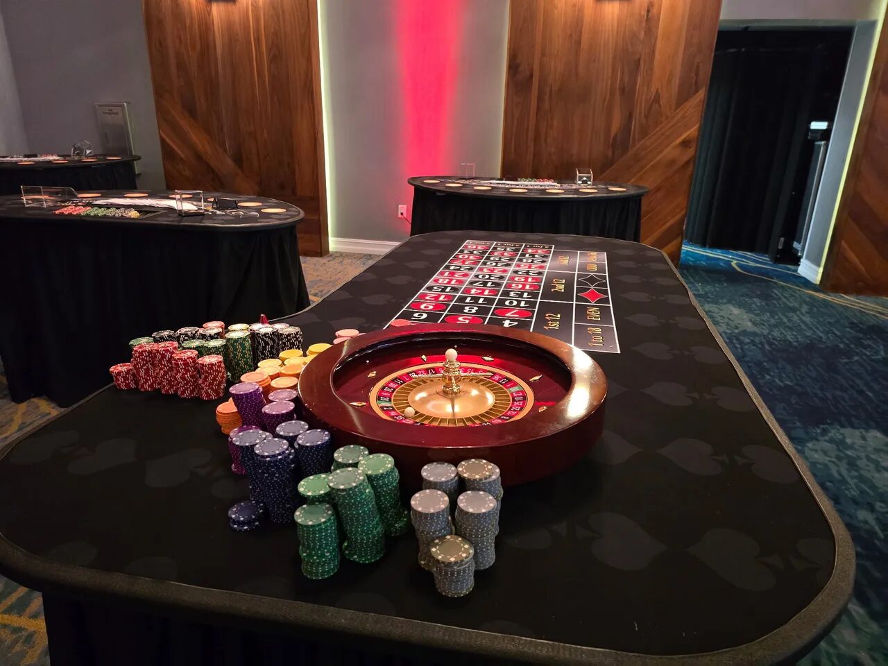 Roulette wheel glowing at a Bay Area holiday casino party