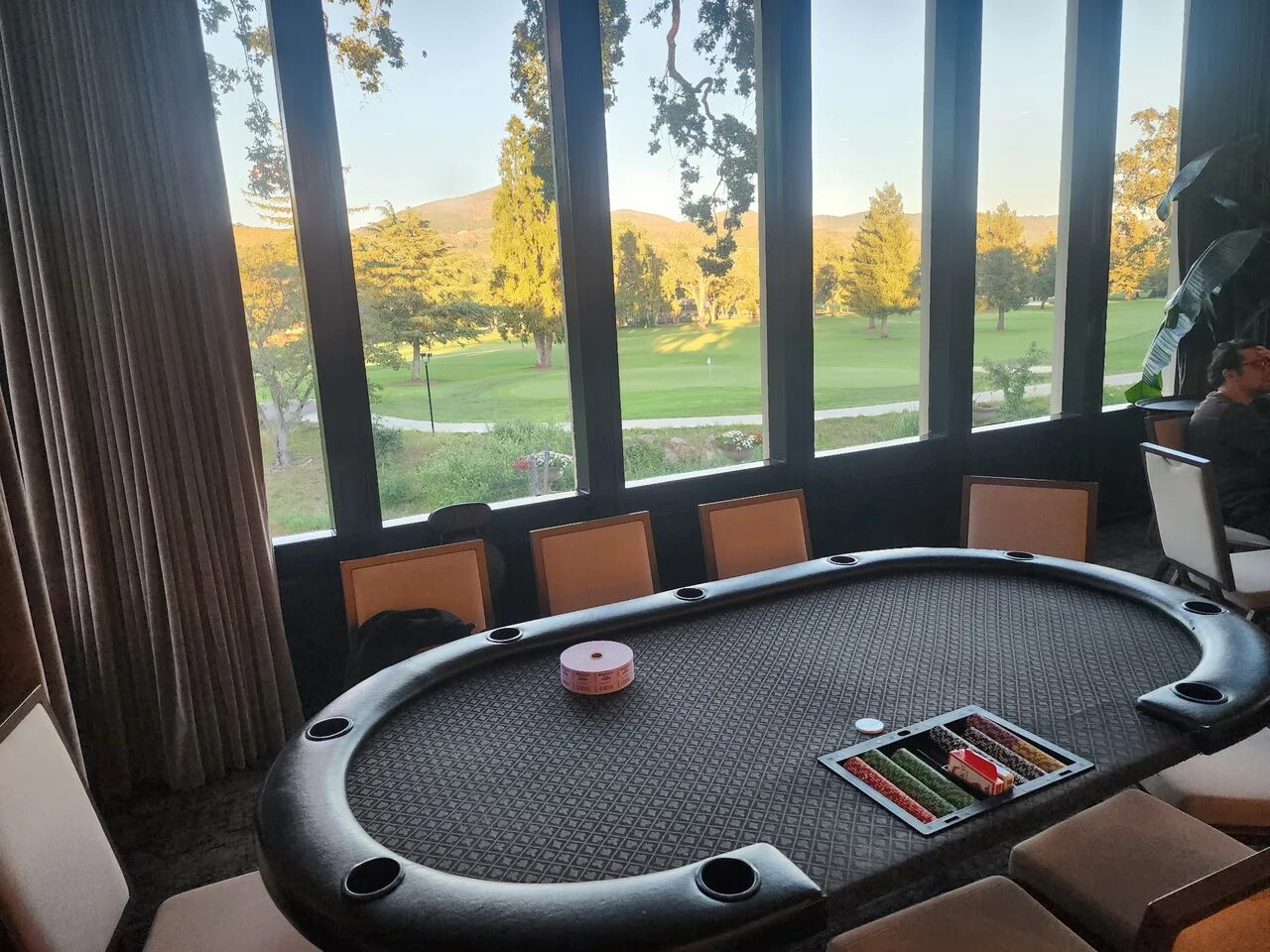 Poker tables set up at a golf course venue in the San Francisco Bay Area
